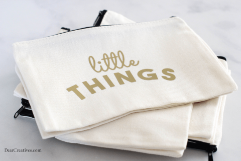 Canvas bag with vinyl letters reading "Little Things"