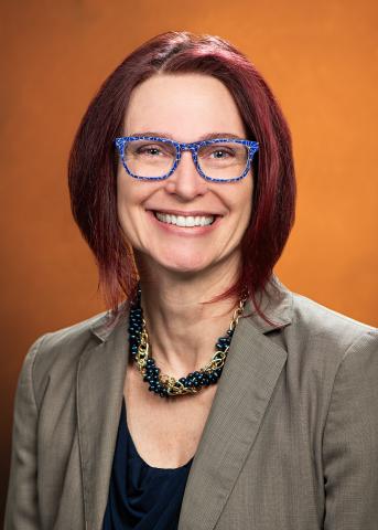 A headshot photo of Dr. Michelle Mifflin