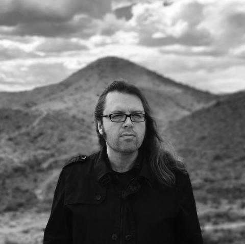 A headshot of Shawnte Orion.