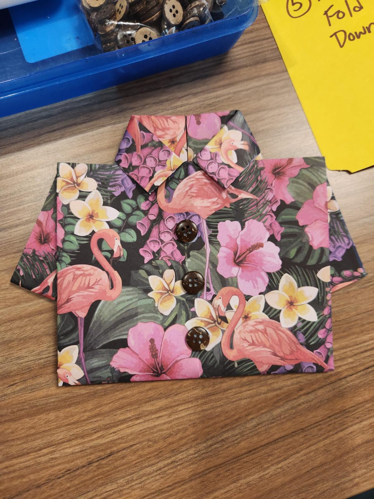 A colorful collared shirt made of paper 